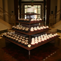 Brown And White Cupcake Tower First wedding with the cupcake tower custom built by my wonderful husband. The bride wanted to match her fall themed brown and white...