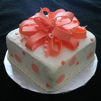 Square Present I am still working on the buttercream smoothing. This is my first square present cake. TFL!