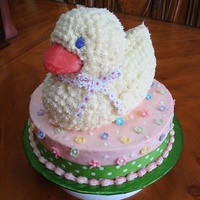 3-D Duck Baby Shower Cake Used 3-D duck pan on 10" rnd. BC with fondant accent and real ribbon on the bottom.