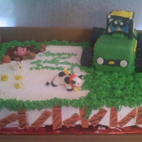 Little John Deere Tractor This was done for a friend's 1st grandson 1st Birthday. cereal treats for the tractor covered with fondant and modeling chocolate for...