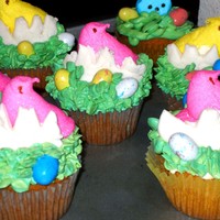 Easter Chick Cup Cakes Some Easter cupcakes. Vanilla buttercream frosting and fondant 'cracked eggs'.