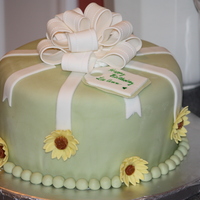 First Fondant Cake This was my final cake for the fondant/gumpaste class. It is a two layer strawberry cake with Wilton fondant tinted green with moss...