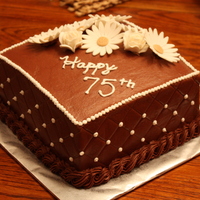 Chocolate 75Th Birthday This was a two layer 8" square cake- chocolate with chocolate buttercream frosting. I used an impression mat to do a diamond pattern...