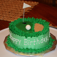 Mini-Golf Birthday Cake This was a 6" round cake for a very small party (2). The cake is iced in green buttercream with fondant accents and brown sugar on top...