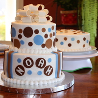 Baby Shower For Noah BC frosting with fondant accents. Gumpaste/Fondant bow on top.