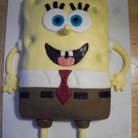 Spongebob Spongebob cake for my son's 4th b-day. 9x13 cake covered in fondant. Legs and arms are fondant also.