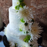 Mini Wedding Cake this is one of my sister's three wedding cakes. the small layer on this cake was made in a mug, haha! It's buttercream covered...