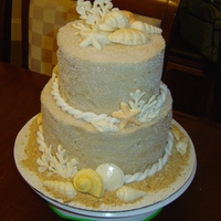 Seashell Wedding Cake mini wedding cake. white chocolate shells covered in pearl luster dust. It is brown sugar buttercream with sugar cyrstals. I used graham...