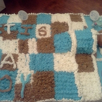 It''s A Boy Quilted Pattern, Butter Cream Icing, with Baby sleeping.