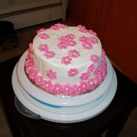 First Time Birthday Cake This is a practice cake for course 1 that I made for a co-workers birthday. I am now addicted to decorating!