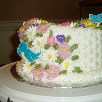 Final Cake Wilton #2 Course Basket weave cake for final class. The basket weave was not as hard as I thought it would be....kind of got into a rhythm ! I kind of went...