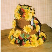 For Our Father 2 Tier chocolat cake & chocolate fondant cover, on the front of cake has my Daughters pictures on both tiers this is a copy of back....