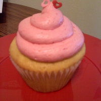 Lemon Raspberry Cupcakes Lemon Cupcake filled with a Raspberry sauce and topped with a Raspberry Buttercream.