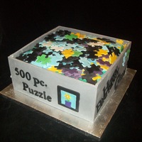 Gina's Puzzle Cake Made this for a lady who loves puzzles. Got the idea from a fellow cake central design and thought I'd make my own.