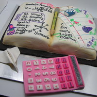 Graduation Math Text Book a cake done by myself and my cousin for a friends graduation party. it took some time to do the calculator and the pencil but it went well...