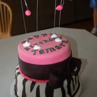 Zebra Cake I made this hot pink zebra cake for a birthday party. I used MMF and the cricut cake for the lettering. I used luster dust on the lettering...
