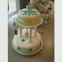 Baby Shower Cake this was a chocolate cake with raspberry filling that I covered in MMF. I used chocolate candy molds for the mobile. I loved how this cake...