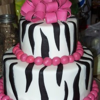 Zebra Stripe Made this for a sweet 16 surprise party. This was my first time using ganache under fondant and let me say - LOVE IT!