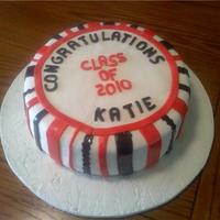 Congrats Graduation cake for a co-worker. This is a vanilla cake with lemon filling. Iced with buttercream then MMF.