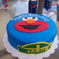 Elmo buttercream with fondant decorations (this is my 1st time working with fondant)