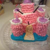 Pink Castle Cake This is my first attempt at decorating a cake. The model was from an old cake book my grandmother had. The cake started to lean backwards...
