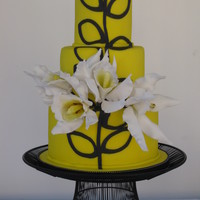 Yello And Black Cake With Sugar Cattleya Orchids 