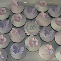 Cupcakes For 85Th Birthday I made these for an 85th. 30 cupcakes in total to be setup on cupcake stand with 85 (which is silver) at the top.