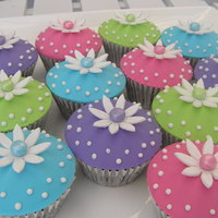 Cupcakes For A 60Th chocolate brownie cupcakes with chocolate ganache covered with fondant.