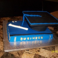 Chocolate Book With Vanilla Graduation Cap. This was my first attempt at a book and graduation cap. Turned out ok but I now know how to make it perfect the next time.