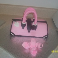 Strawberry Cake With Strawberry Filing Wasn't able to decorate the board like I had hoped but I think the purse itself turned out ok.