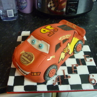 Lightning Mcqueen Cake all fondant with handpainted logos.
