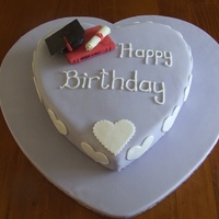 Grad Birthday Cake My first steps in using flower paste... Oh! How I suffered over that mortarboard!! In the end, I modelled the curved part over a wee tiny...