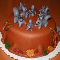 Squirrel Family On A Stump Cake made for a baby shower for friends who love squirrels. Cake was a 3-layer white cake with almond milk buttercream and fondant....