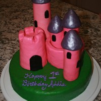 Sculptured Princess Castle Cake Rice Krispie sculpted turrets, covered in fondant, dusted with glitter powder. Crafted for a little girl's 1st birthday party.