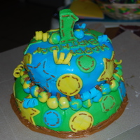 Camrens 1St Birthday Cake!! My first fondant cake!! I made this for my sons first birthday!! had so much fun making it! I want to make cakes like this everday!:)