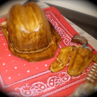 Cowboy Hat With Six Shooter And Bullets! Mother in Law wanted this cake to go to Steeple Chase, their theme was how the west was won!
