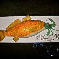 Red Fish With Blue Crab Bait! I made this cake for my husband for Father's Day. He's a huge fishermen and his most favorite fish in the world is a redfish....