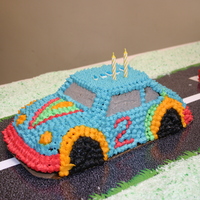 Car We shared a birthday with 2 others and each used the same car tin but decorated them differently. They were all displayed on a road and...