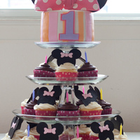 Minnie Mouse 1St Birthday This cake was designed to go with the baby Minnie first birthday party ware. 6" smash cake and 30 cupcakes matching the theme.