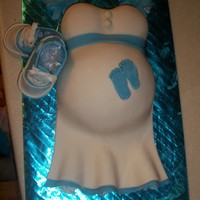Belly Cake I made this for my sister-in-law who just found out she was having a boy today! I got the idea from all the cakes on cc. The baby feet on...