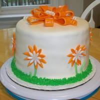 Daisys And Bows I am trying to teach myself how to decorate cakes and how to use fondant. Not going very well. :( I covered the cake with fondant and it...