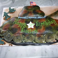 Camo Army Tank The boy that this cake was made for requested camo, army, barbed wire, and cupcakes. This was made out of 24 cupcakes and the gun barrel is...