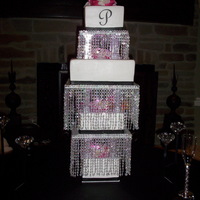 Chandelier Wedding Cake I made this cake for my Daughter's wedding this weekend. She wanted something different and with crystals. This is what we came up...