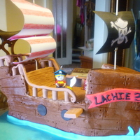 Buttercream Pirate Ship choc butter cream covered pirate ship with fondant decorations. lots of fun, for a 3 yr olds bday, he was very excited and stoop...