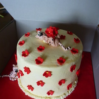 Red Flower Cake red flower, buttercream covered and cheeky cheetah cake