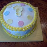 Baby Shower Cake This is a cake I made for a friend. She is getting the family together to let them know what she is having.