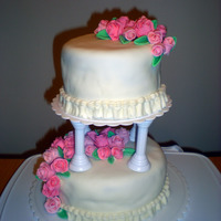 Pink Roses First tiered cake... it's not really for a wedding but i think it could be lol