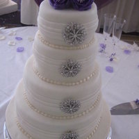 Pleats And Brooches 4 tier cake with pleats and brooches