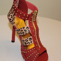 Red/ Leopard Print Gum Paste Stiletto I was snowed in for 3 days so I decided to make a gum paste stiletto. All gum paste except for one wire inside the heel. The heel is made...