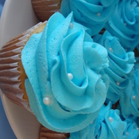 Wedding Shower Cupcakes Cupcakes for a bridal shower iced in buttercream with tip 1M and decorated with sugar pearls. Color is Wilton's Sky Blue